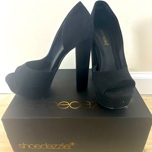 Black peep toe pumps, brand new. Size 6.5 (runs large)